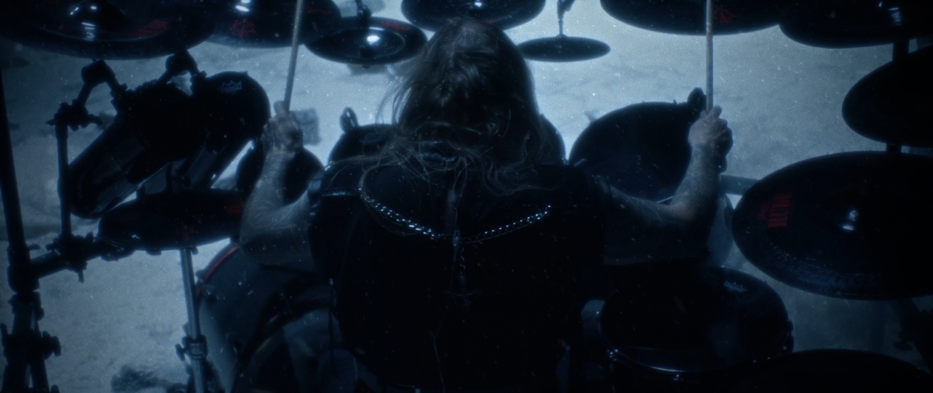 Behemoth Mystic still - overhead shot of a drummer mid-performance, cymbals framing the shot
