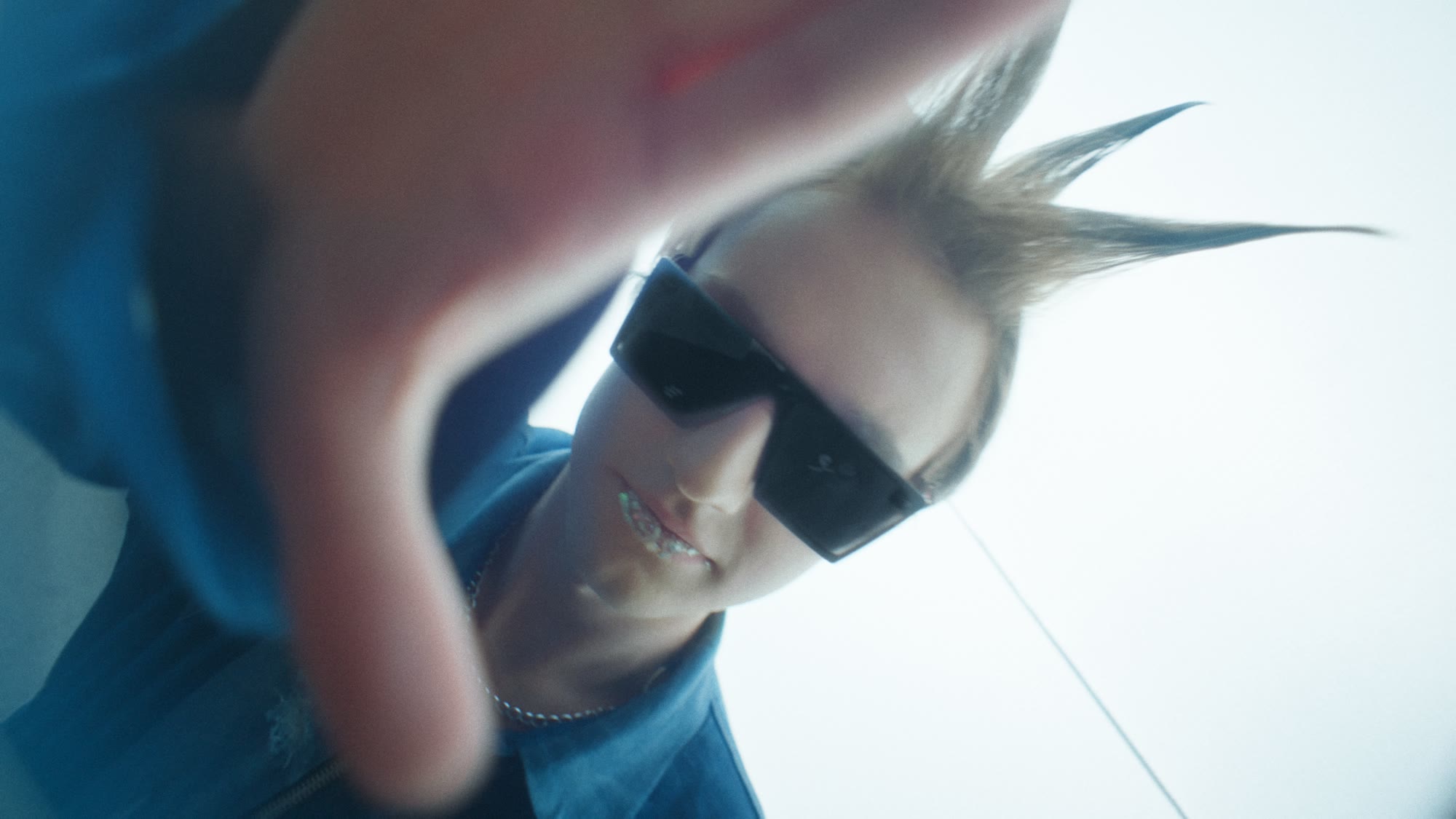 Blurred action shot of a model reaching toward the camera - Wrocław Fashion Week