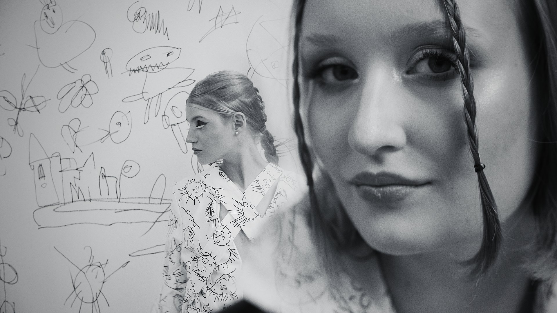 Split composition - illustrated sketch beside a model's close-up portrait - Wrocław Fashion Week Collections