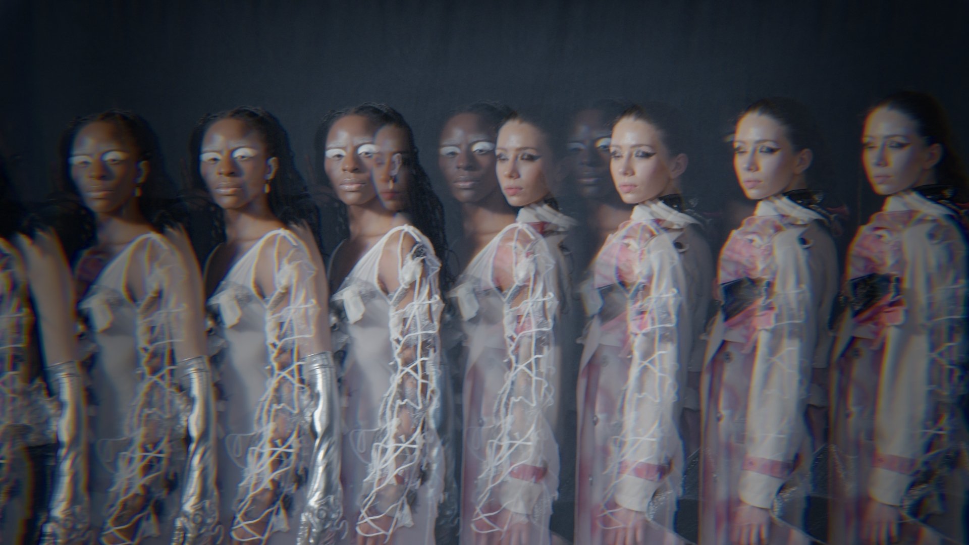 Line of models in matching iridescent gowns - Wrocław Fashion Week Collections