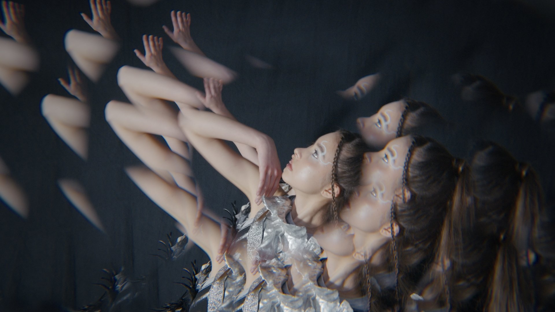 Abstract shot of hands reaching upward through dark fabric - Wrocław Fashion Week Collections