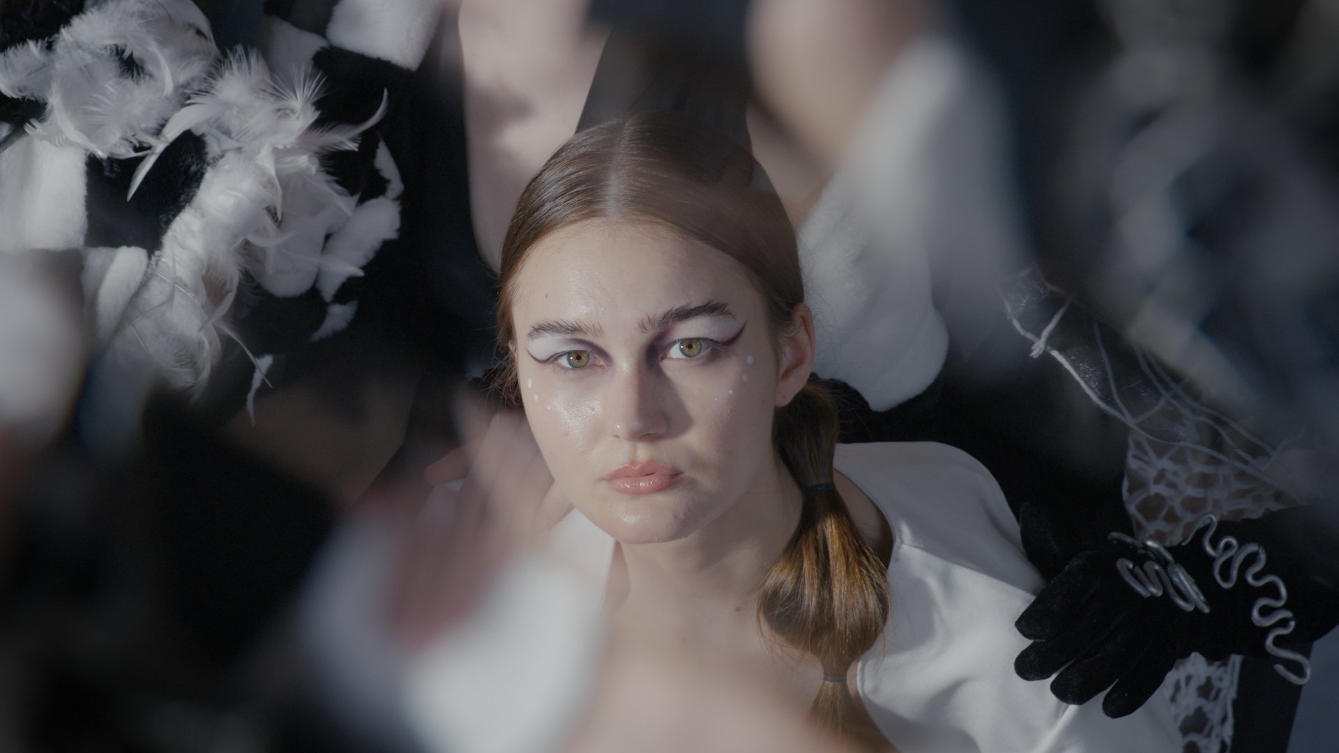 Close-up portrait with a delicate white lace collar - Wrocław Fashion Week Collections